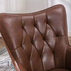 Fauteuil d'appoint en cuir marron foncé avec dossier capitonné et accoudoirs ailés