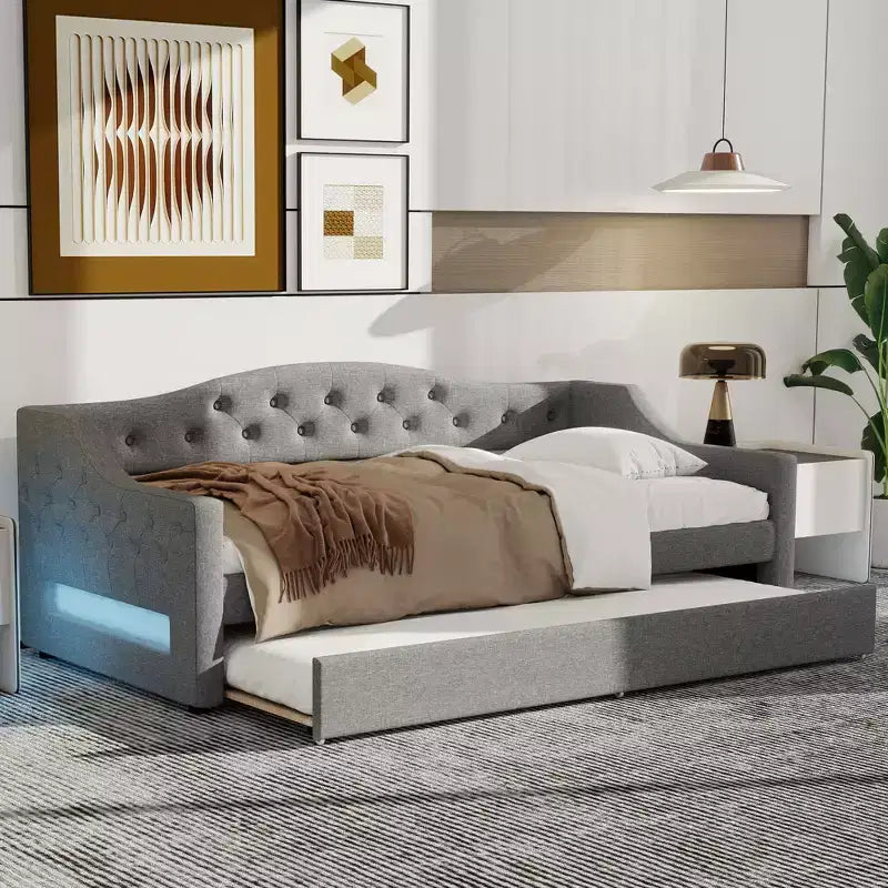Lit de jour double XL rembourré Whisen avec lit gigogne et éclairage LED