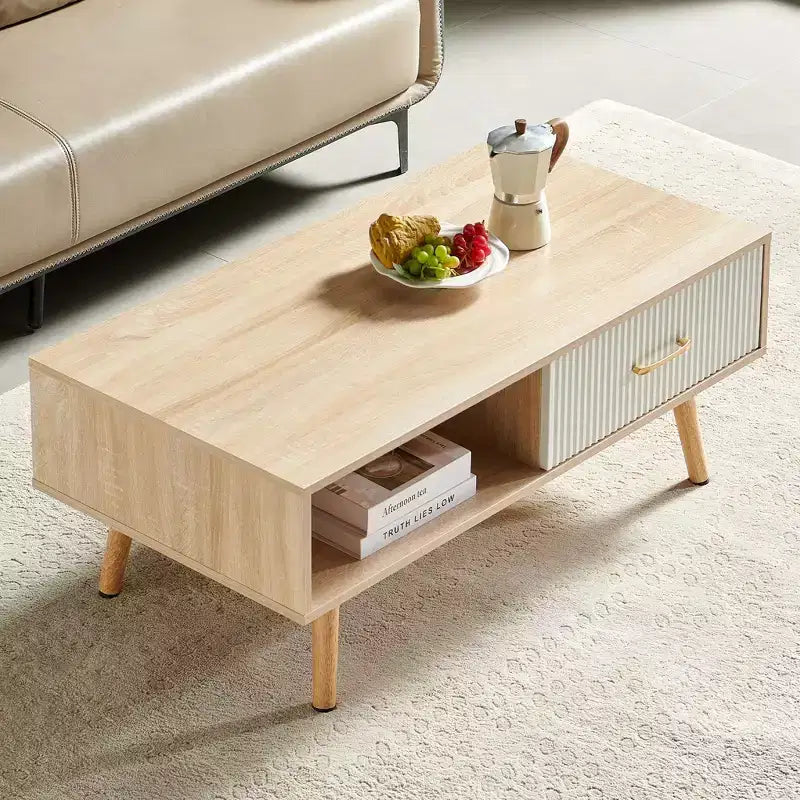 Table basse rectangulaire couleur bois naturel avec pieds en bois massif et tiroir coulissant