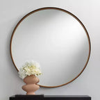 Miroir mural rond Uttermost Andi noir et or 34 po