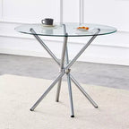 Table à manger ronde Okak moderne en verre trempé pour 4 personnes avec piètement croisé en métal pour salle à manger, salon, bureau, cuisine