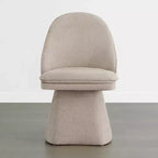 Chaise de salle à manger pivotante Spruce&Spring avec dossier haut incurvé et base conique