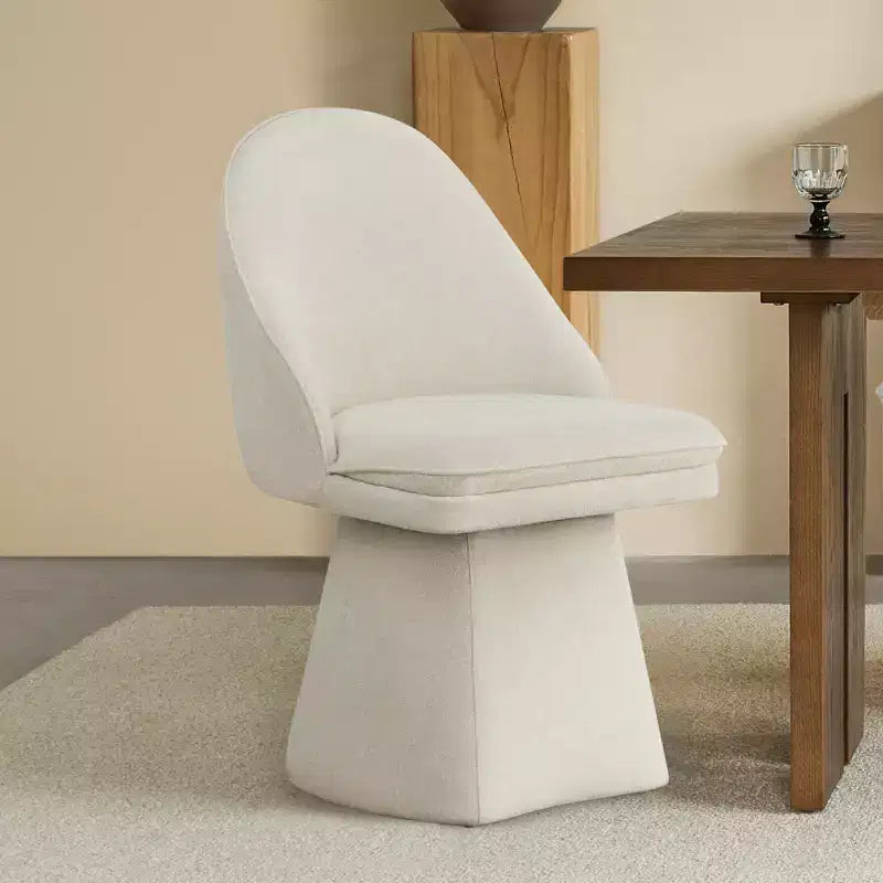 Chaise de salle à manger pivotante Spruce&Spring avec dossier haut incurvé et base conique