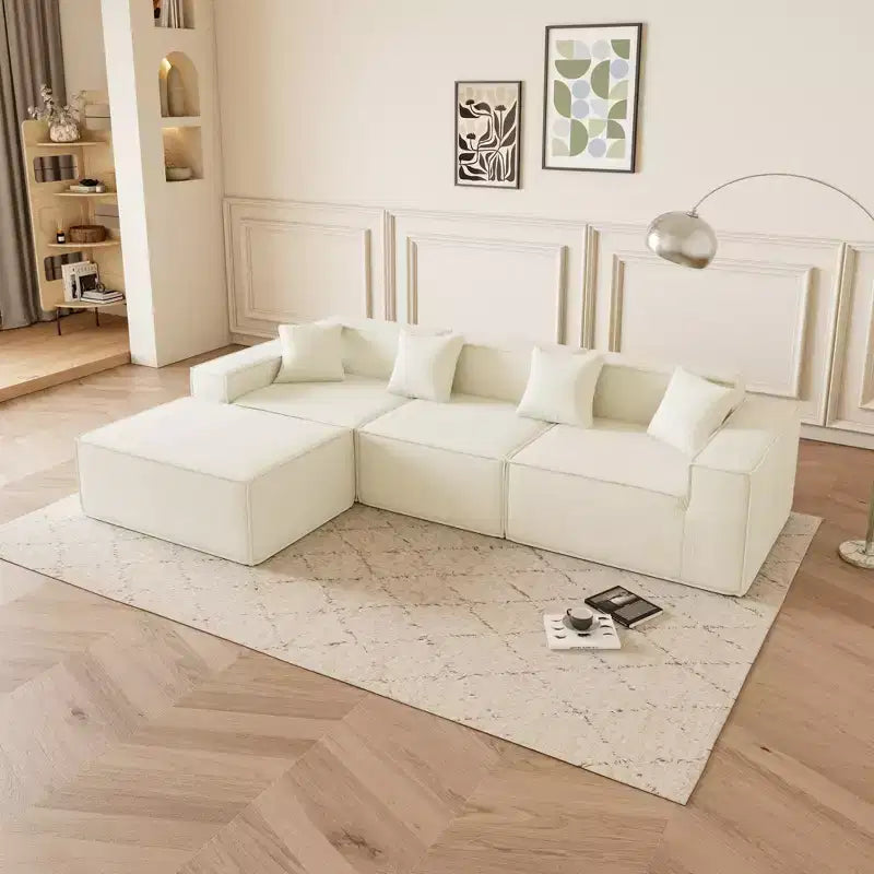 Canapé sectionnel GDFStudio Nira moderne de 277 cm à 3 places réversible sans cadre, recouvert de velours côtelé, avec pouf et 4 oreillers