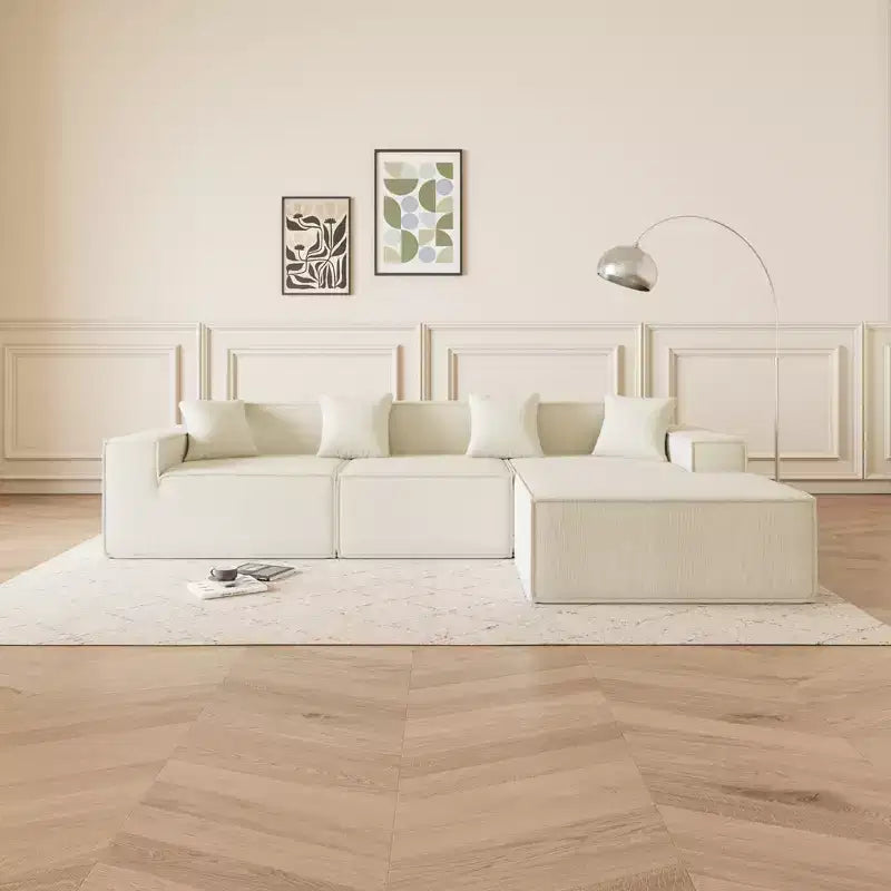 Canapé sectionnel GDFStudio Nira moderne de 277 cm à 3 places réversible sans cadre, recouvert de velours côtelé, avec pouf et 4 oreillers