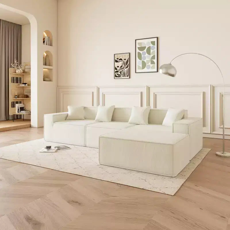 Canapé sectionnel GDFStudio Nira moderne de 277 cm à 3 places réversible sans cadre, recouvert de velours côtelé, avec pouf et 4 oreillers