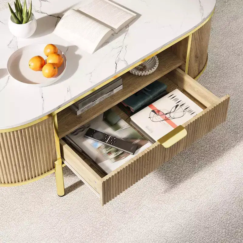 Table basse ovale 48 pouces - Table basse centrale cannelée moderne avec tiroir de rangement, plateau en faux marbre et pieds en métal doré pour salon