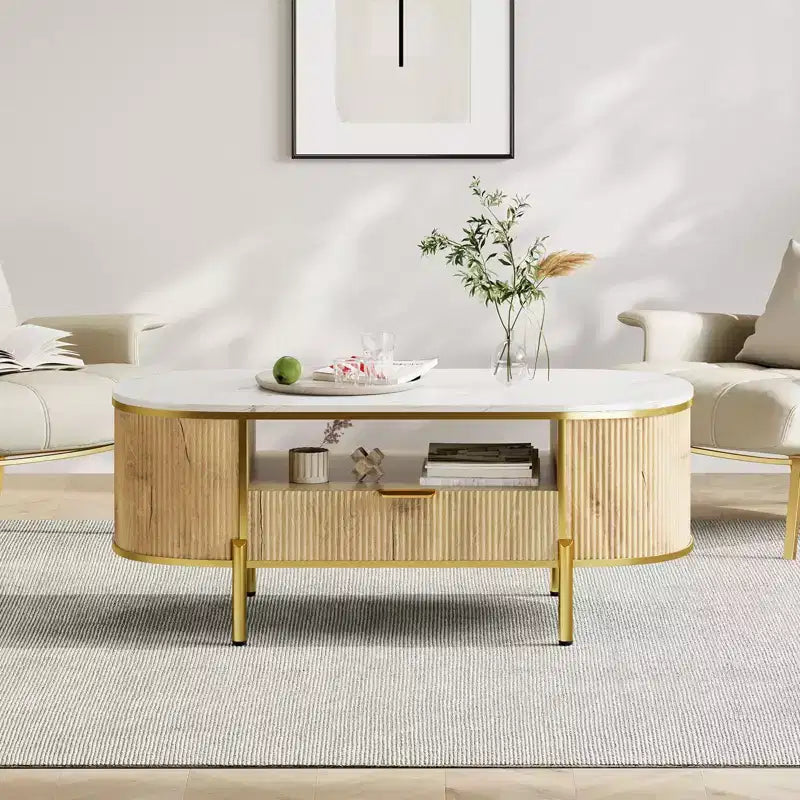 Table basse ovale 48 pouces - Table basse centrale cannelée moderne avec tiroir de rangement, plateau en faux marbre et pieds en métal doré pour salon