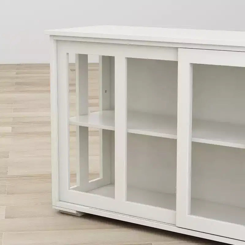 Meuble de rangement de cuisine JVNOXK de 42 pouces avec portes vitrées, comprenant deux portes coulissantes en verre, deux grilles d'aération latérales et une étagère réglable. Blanc
