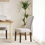 Chaises de salle à manger modernes Okak, lot de 2, avec garniture cloutée, chaises de salle à manger en similicuir avec pieds en bois, chaises de cuisine pour salle à manger