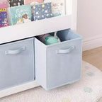 Étagère à livres pour enfants avec 3 niveaux de présentation frontale et 3 bacs en tissu, bibliothèque pour tout-petits et organisateur de rangement de jouets pour salle de jeux, blanche