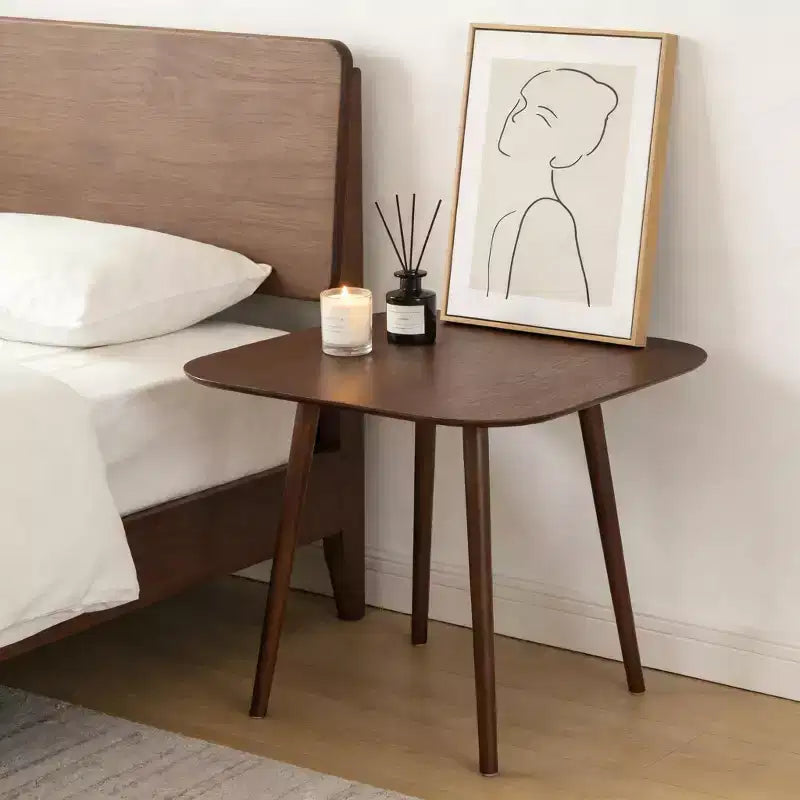 JVNOXK 35-inch square dining table, minimalist design with tapered outward-flared legs, perfect for family gatherings. Walnut