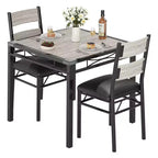 Ensemble de table à manger peu encombrant en MDF avec base en fer et chaises gigognes pour petite cuisine, appartement ou coin petit-déjeuner