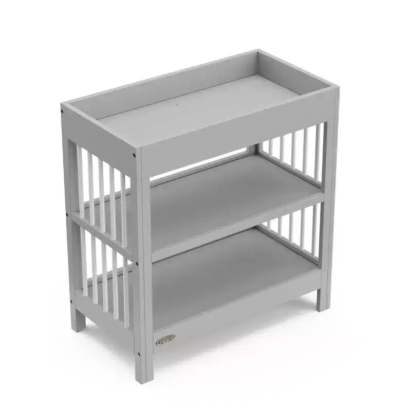 Table à langer Teddi de Graco avec matelas à langer résistant à l'eau