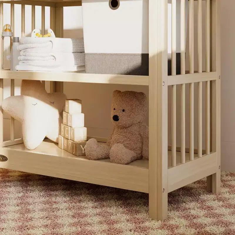 Table à langer Teddi de Graco avec matelas à langer résistant à l'eau