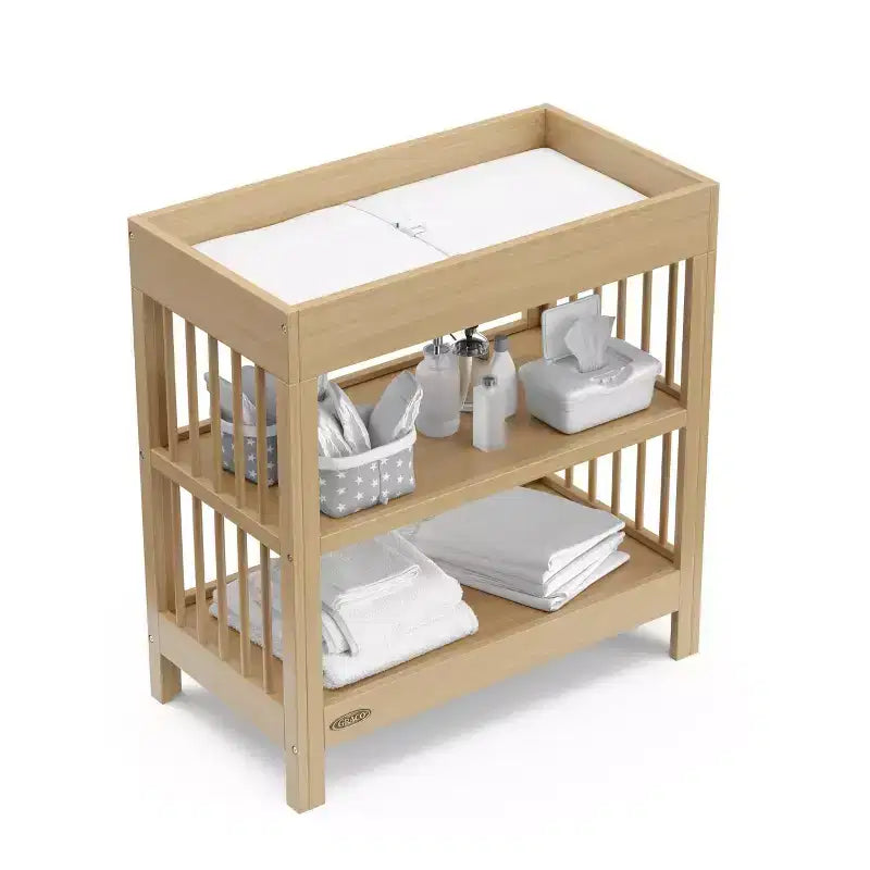 Table à langer Teddi de Graco avec matelas à langer résistant à l'eau