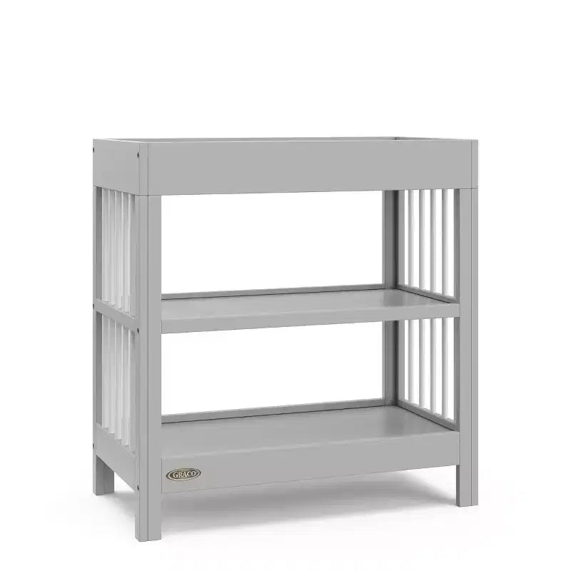 Table à langer Teddi de Graco avec matelas à langer résistant à l'eau