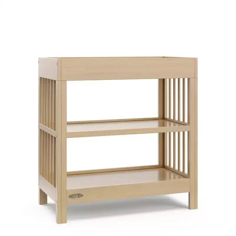 Table à langer Teddi de Graco avec matelas à langer résistant à l'eau