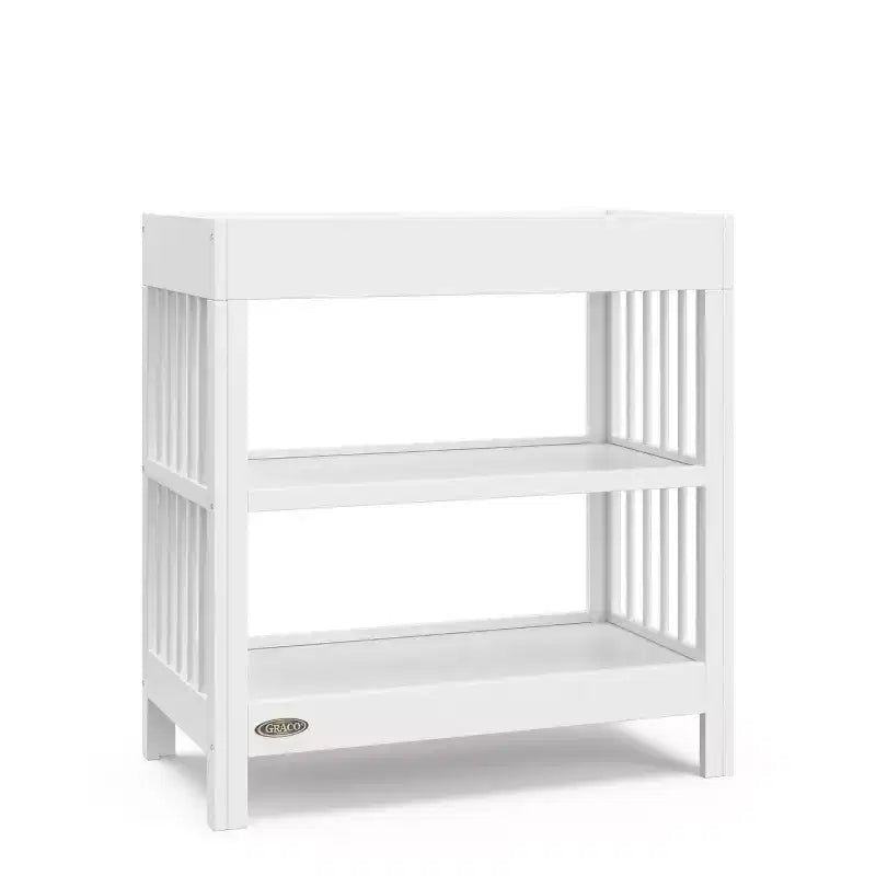 Table à langer Teddi de Graco avec matelas à langer résistant à l'eau