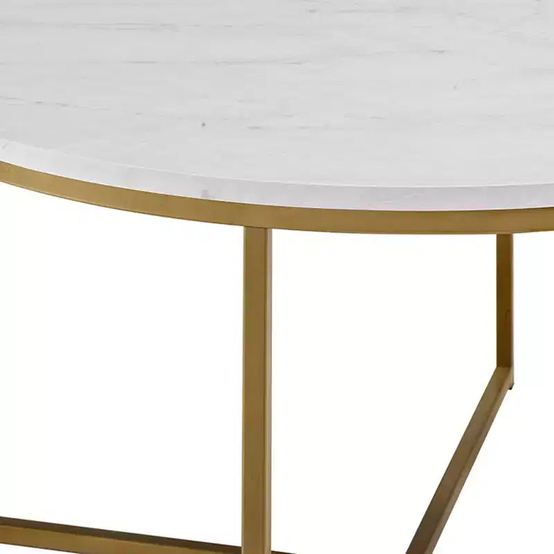 Table basse ronde Vivian Glam X Leg en faux marbre - Saracina Home