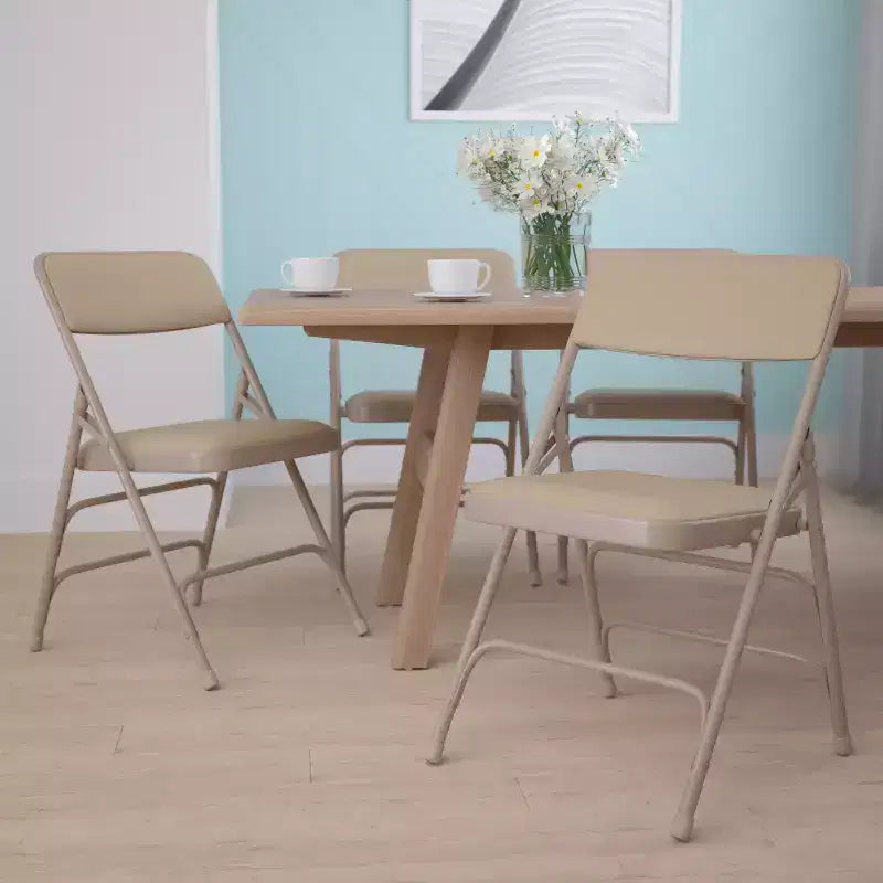 Lot de 4 chaises pliantes en métal rembourrées incurvées HERCULES à triple entretoise et double charnière de Flash Furniture