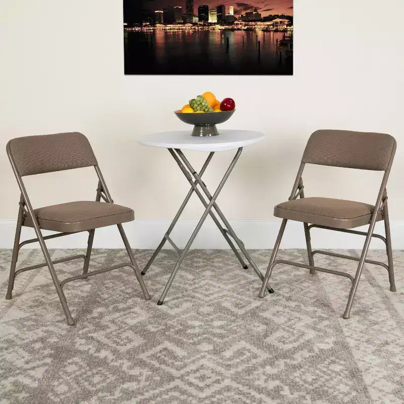 Lot de 4 chaises pliantes en métal rembourrées incurvées HERCULES à triple entretoise et double charnière de Flash Furniture