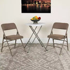 Lot de 4 chaises pliantes en métal rembourrées incurvées HERCULES à triple entretoise et double charnière de Flash Furniture