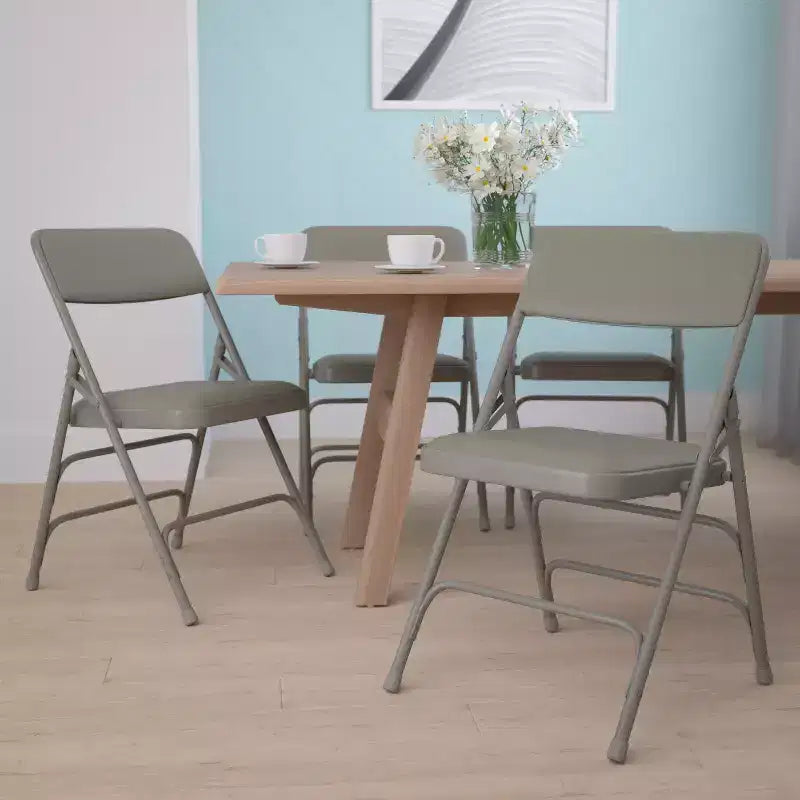 Lot de 4 chaises pliantes en métal rembourrées incurvées HERCULES à triple entretoise et double charnière de Flash Furniture