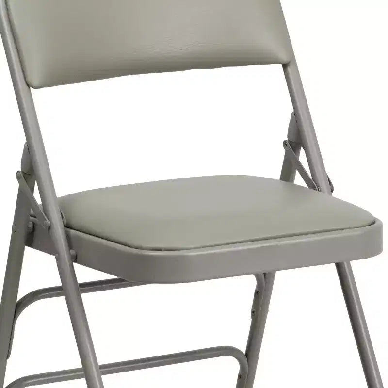 Lot de 4 chaises pliantes en métal rembourrées incurvées HERCULES à triple entretoise et double charnière de Flash Furniture