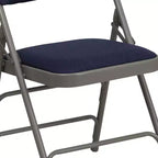 Lot de 4 chaises pliantes en métal rembourrées incurvées HERCULES à triple entretoise et double charnière de Flash Furniture