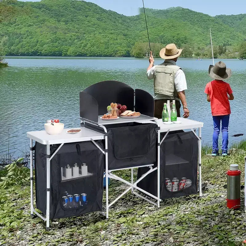 Table de cuisine de camping portable pliable en aluminium Outsunny avec pare-vent et 3 placards fermés pour barbecue, fête, pique-niques, jardins