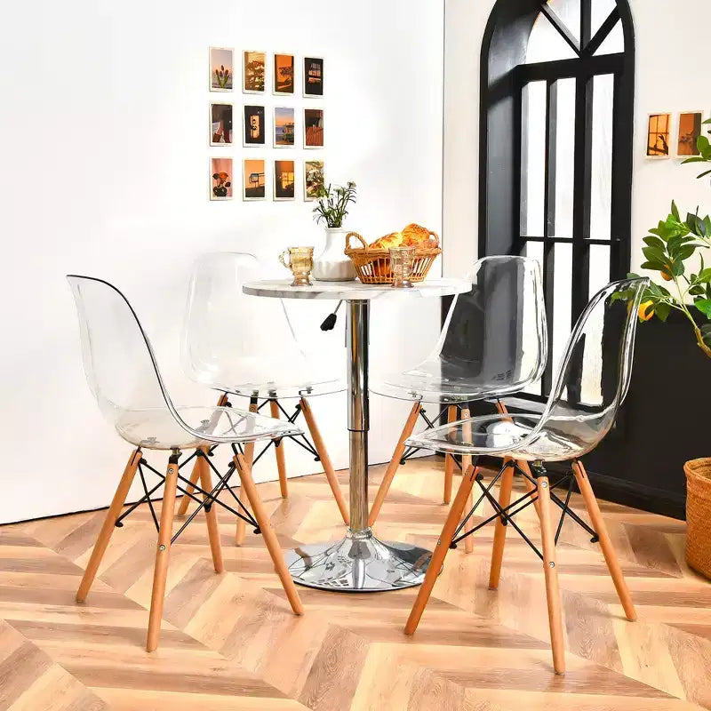 Lot de 4 chaises de salle à manger Costway modernes en plastique avec assise transparente et pieds en bois