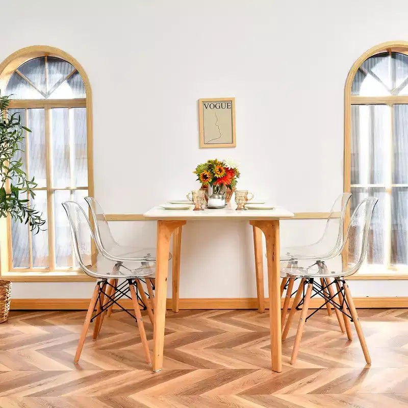 Lot de 4 chaises de salle à manger Costway modernes en plastique avec assise transparente et pieds en bois