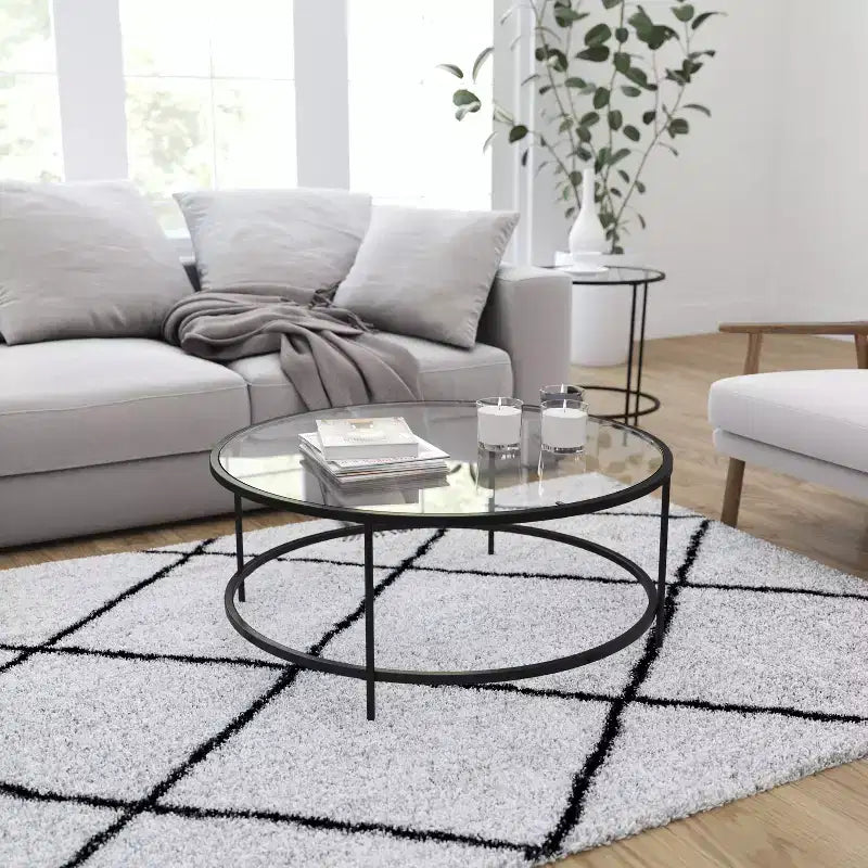 Table basse en verre Newbury Merrick Lane avec cadre rond doré mat et pieds verticaux
