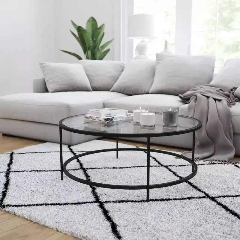 Table basse en verre Newbury Merrick Lane avec cadre rond doré mat et pieds verticaux