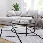 Table basse en verre Newbury Merrick Lane avec cadre rond doré mat et pieds verticaux