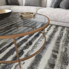 Table basse en verre Newbury Merrick Lane avec cadre rond doré mat et pieds verticaux