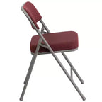 Chaise pliante en métal Emma et Oliver (lot de 4) haut de gamme, rembourrée en tissu, avec triple renfort incurvé et charnières