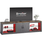 Meuble TV Bestier 70 LED pour téléviseurs jusqu'à 75 pouces, console média de centre de divertissement avec étagères réglables en verre trempé et rangement fermé pour le salon