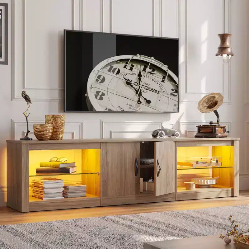 Meuble TV Bestier 70 LED pour téléviseurs jusqu'à 75 pouces, console média de centre de divertissement avec étagères réglables en verre trempé et rangement fermé pour le salon
